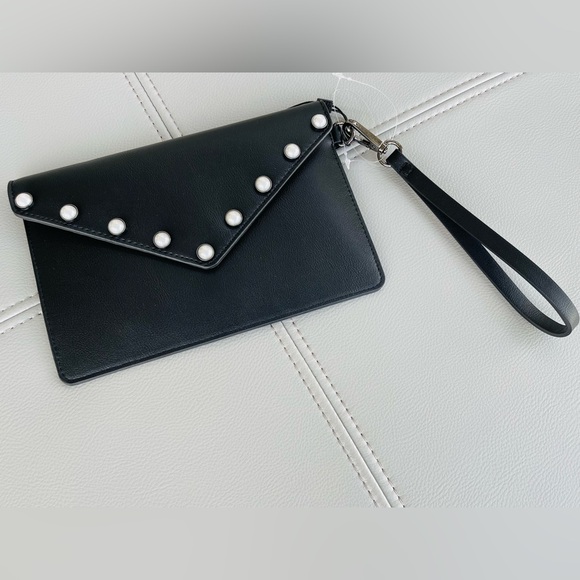 New With Tags
BCBG Pearl + Leather Inspired
Envelope Clutch in
BLACK - Picture 6 of 15